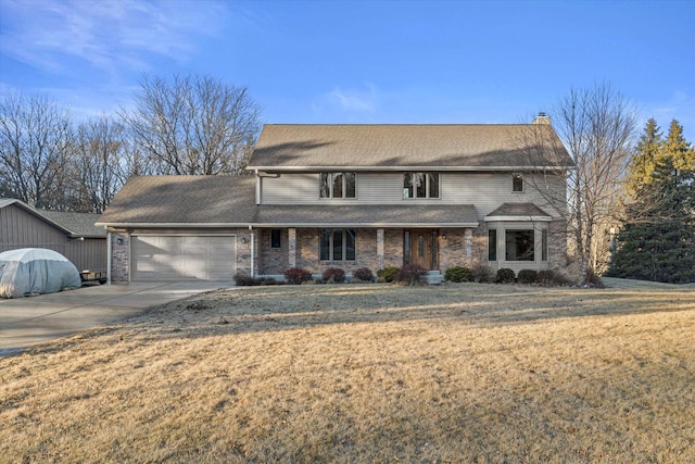 front facade with a garage and a front yard