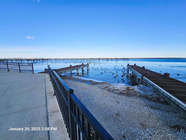 view of dock with a water view