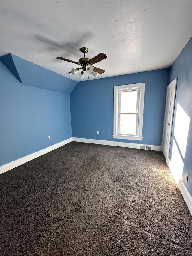 bonus room with carpet, lofted ceiling, and ceiling fan