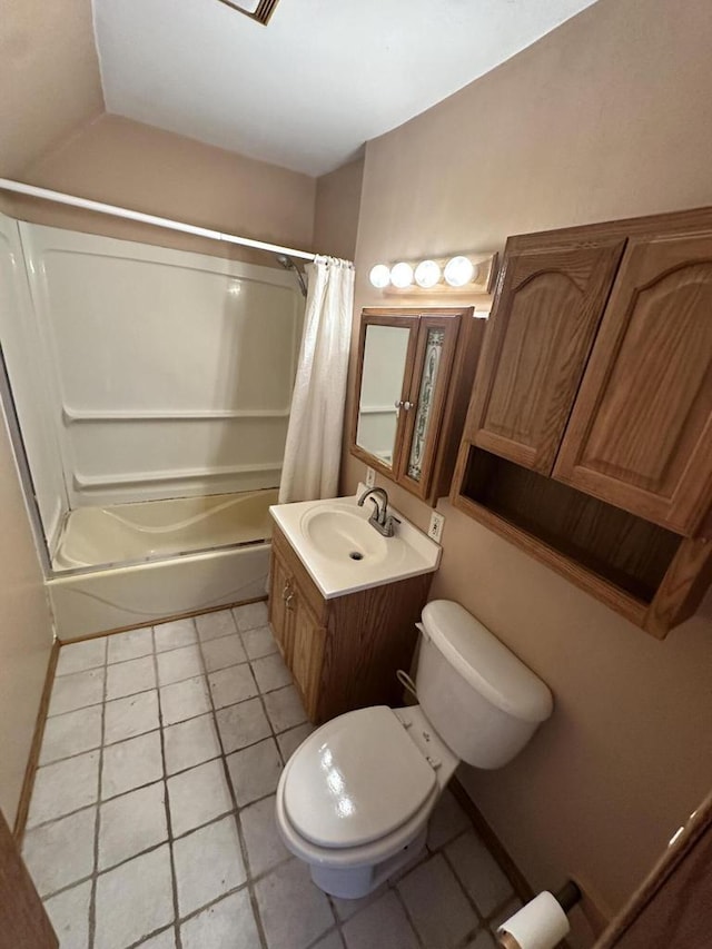 full bathroom with vanity, tile patterned floors, toilet, and shower / bath combo with shower curtain