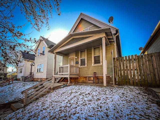 view of front of property featuring covered porch