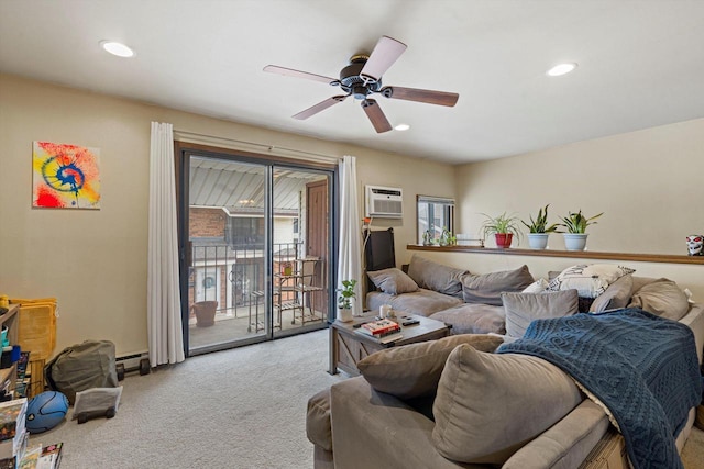 carpeted living room with an AC wall unit, ceiling fan, and baseboard heating