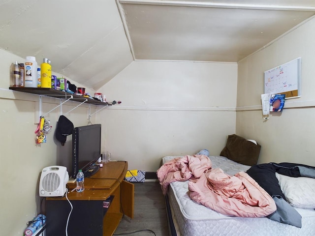 bedroom featuring lofted ceiling