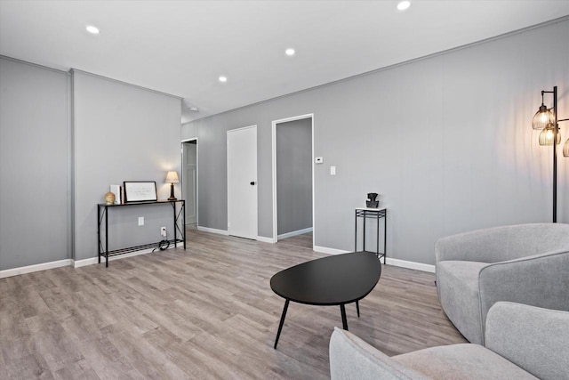 sitting room with light hardwood / wood-style flooring