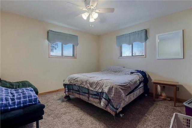 bedroom with ceiling fan and carpet