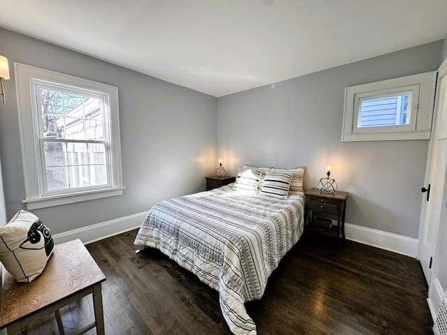 bedroom featuring dark hardwood / wood-style floors