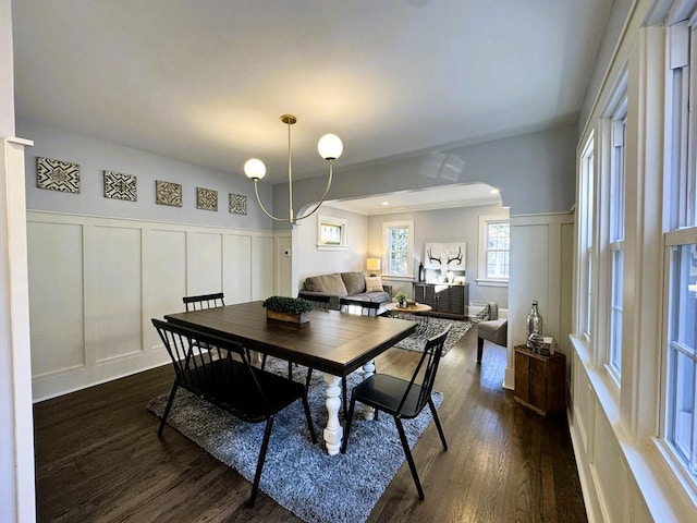 dining area featuring dark hardwood / wood-style floors