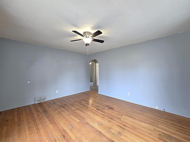 unfurnished room with light hardwood / wood-style flooring and ceiling fan