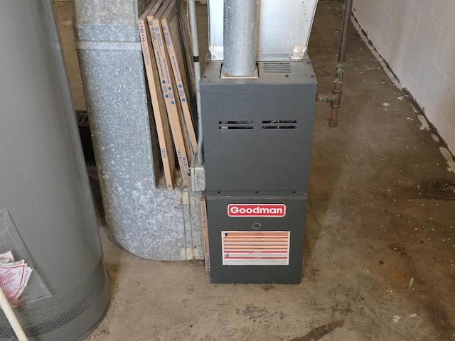 utilities featuring heating unit and gas water heater