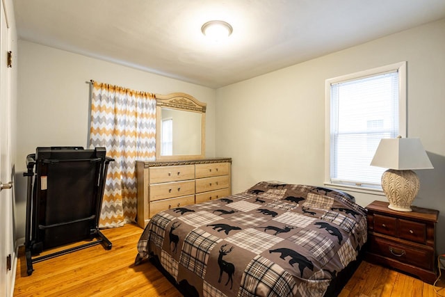 bedroom featuring light wood-type flooring