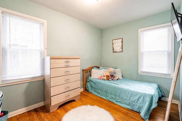 bedroom featuring light wood-type flooring