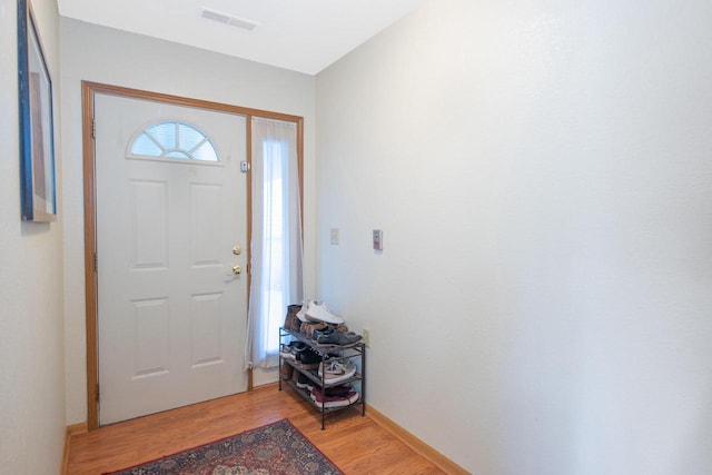 foyer entrance featuring light hardwood / wood-style flooring