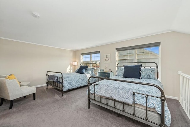 carpeted bedroom featuring vaulted ceiling and crown molding