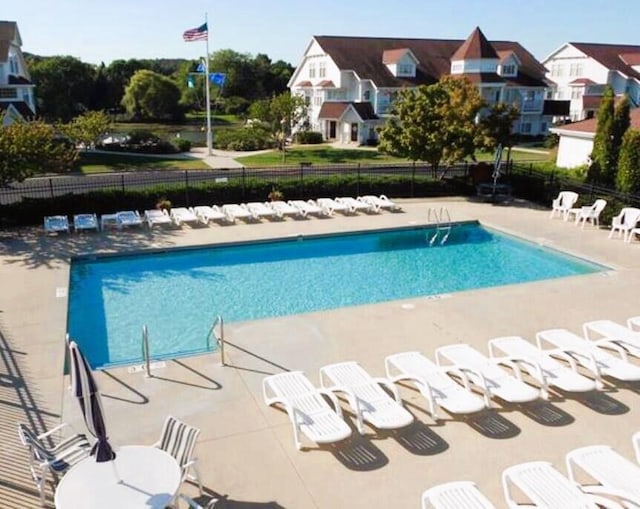 view of pool with a patio area