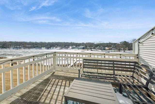 view of snow covered deck