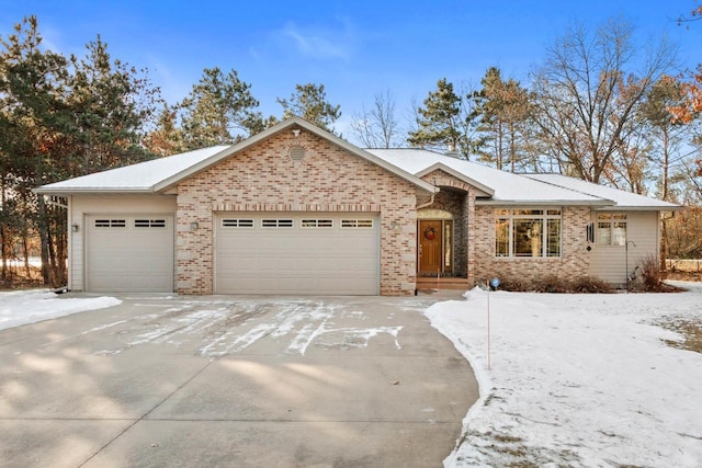 ranch-style home featuring a garage