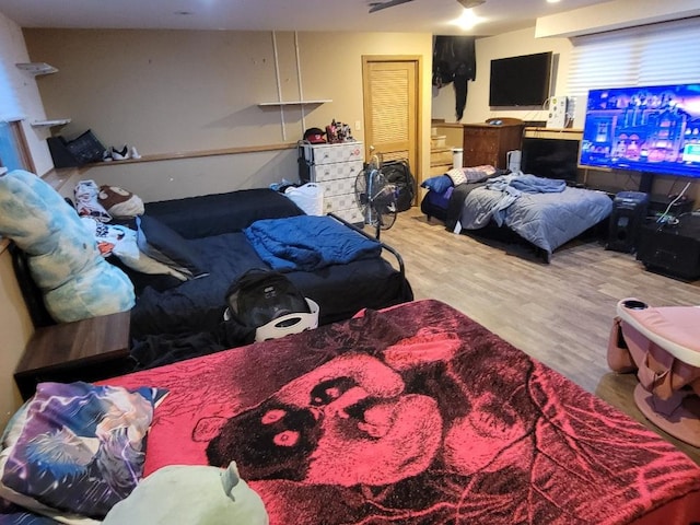 bedroom with hardwood / wood-style floors