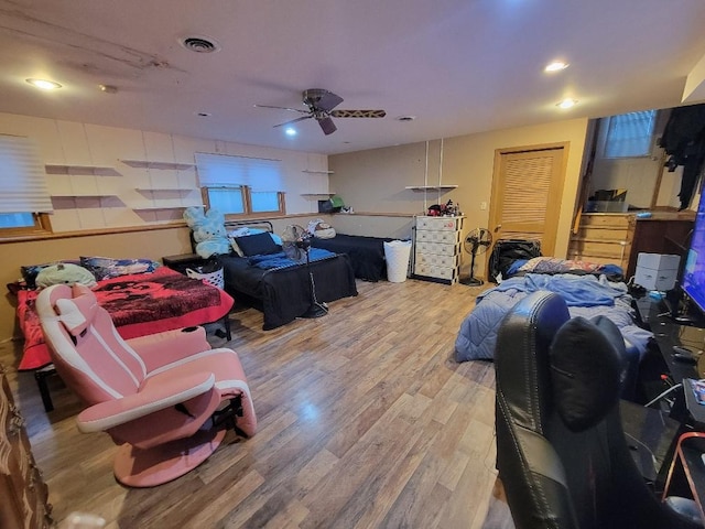 interior space featuring ceiling fan and wood-type flooring