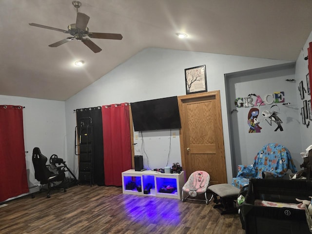 rec room with ceiling fan, lofted ceiling, and dark hardwood / wood-style floors