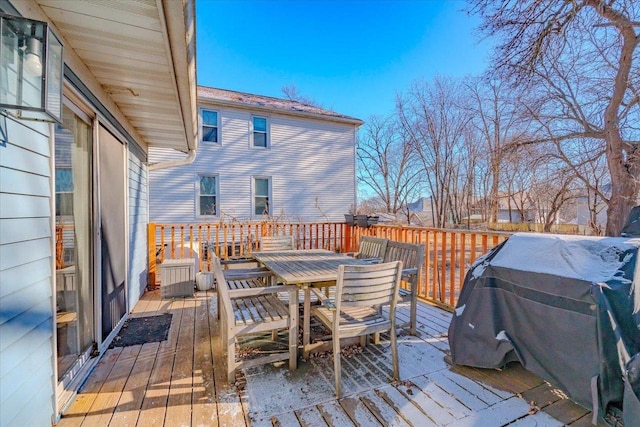 wooden deck featuring grilling area