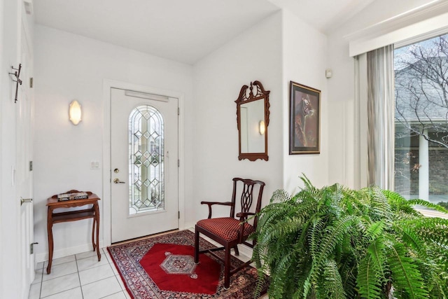 entryway with light tile patterned floors