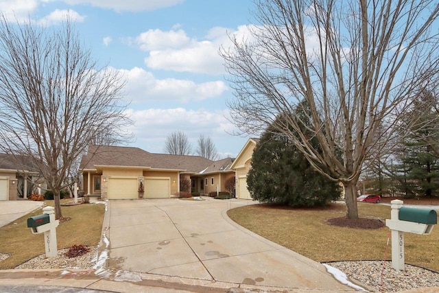 ranch-style house with a garage and a front lawn