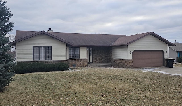 single story home with a garage and a front lawn