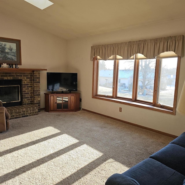 carpeted living room with vaulted ceiling and a fireplace