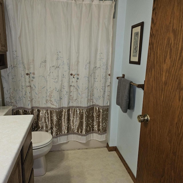 full bathroom featuring vanity, toilet, and shower / bath combo