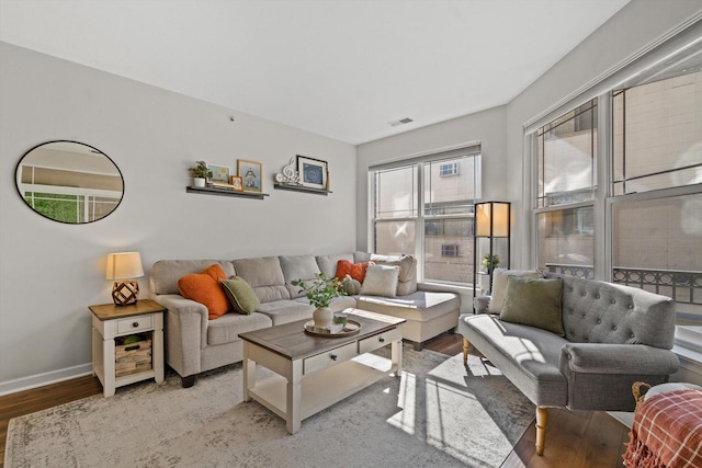 living room with light hardwood / wood-style flooring