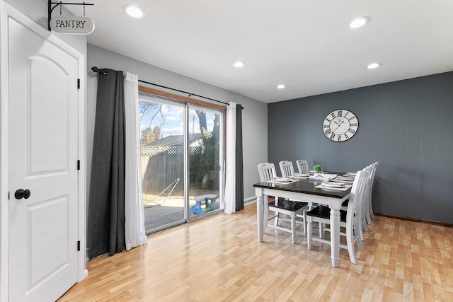 dining space featuring light hardwood / wood-style floors