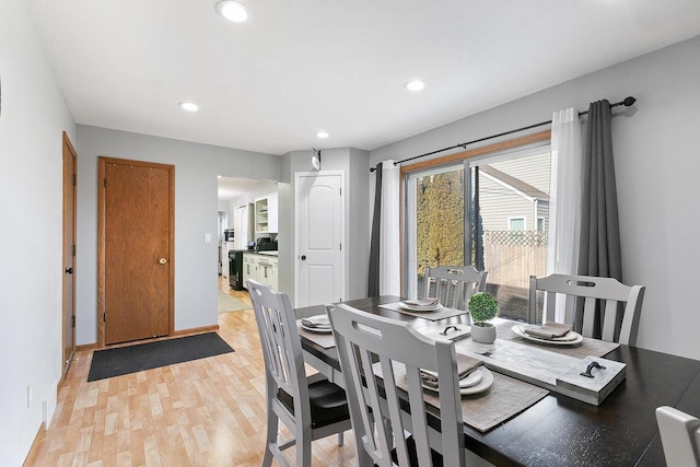 dining room with light hardwood / wood-style floors