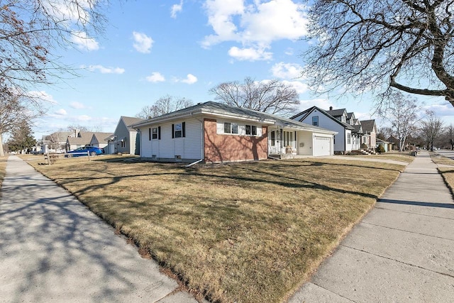 view of property exterior featuring a garage and a yard