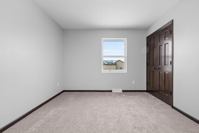 unfurnished bedroom featuring carpet floors