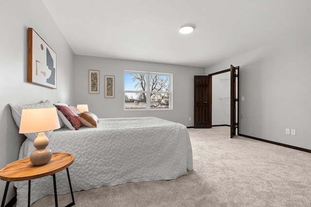 bedroom featuring light colored carpet