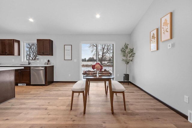 dining room with light hardwood / wood-style floors