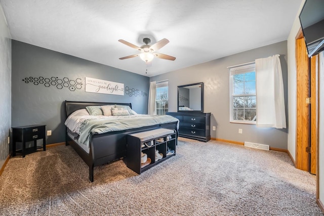 carpeted bedroom featuring ceiling fan