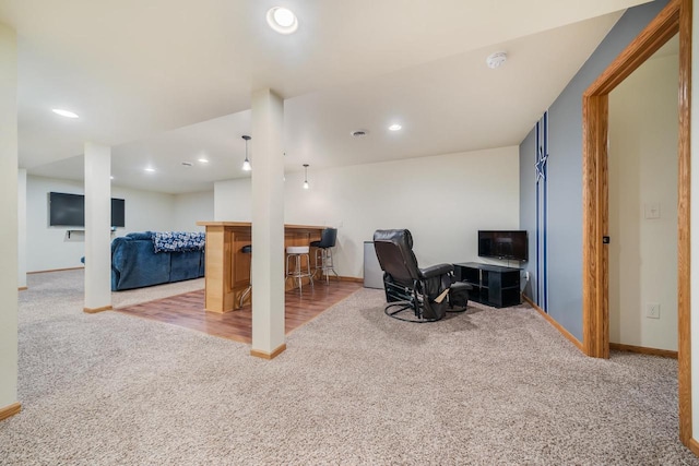 office space with bar and carpet floors