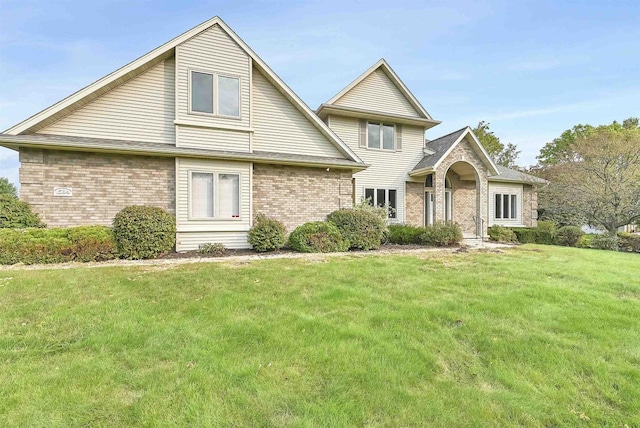 view of property featuring a front yard