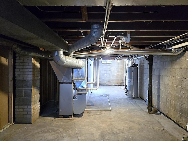 basement featuring water heater and heating unit