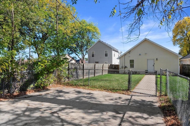 rear view of property with a yard