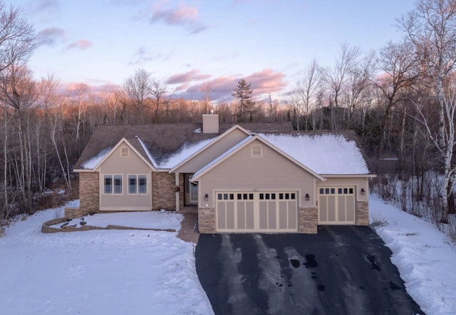 ranch-style home with a garage