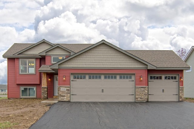 craftsman house featuring a garage