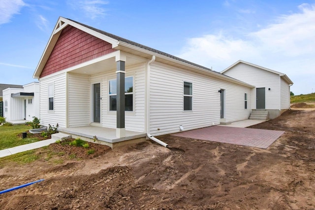 rear view of property with a patio area