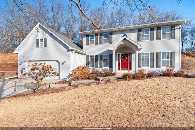 colonial inspired home with a garage