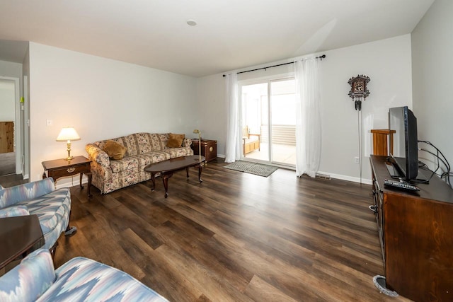 living room with dark wood-type flooring