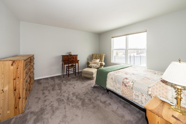 bedroom featuring dark colored carpet