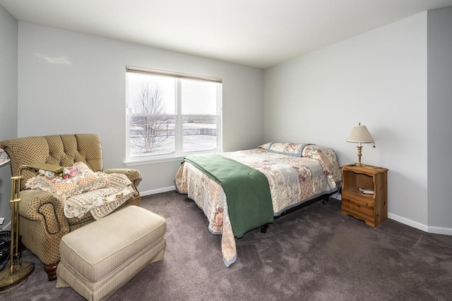 bedroom with dark colored carpet