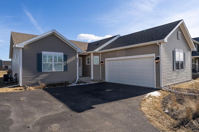 ranch-style home with a garage