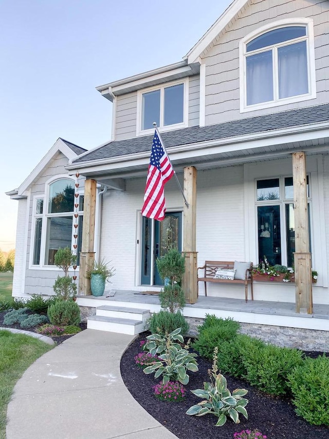 entrance to property with a porch